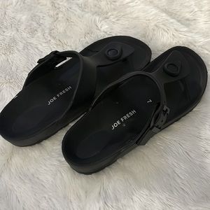 Black slippers